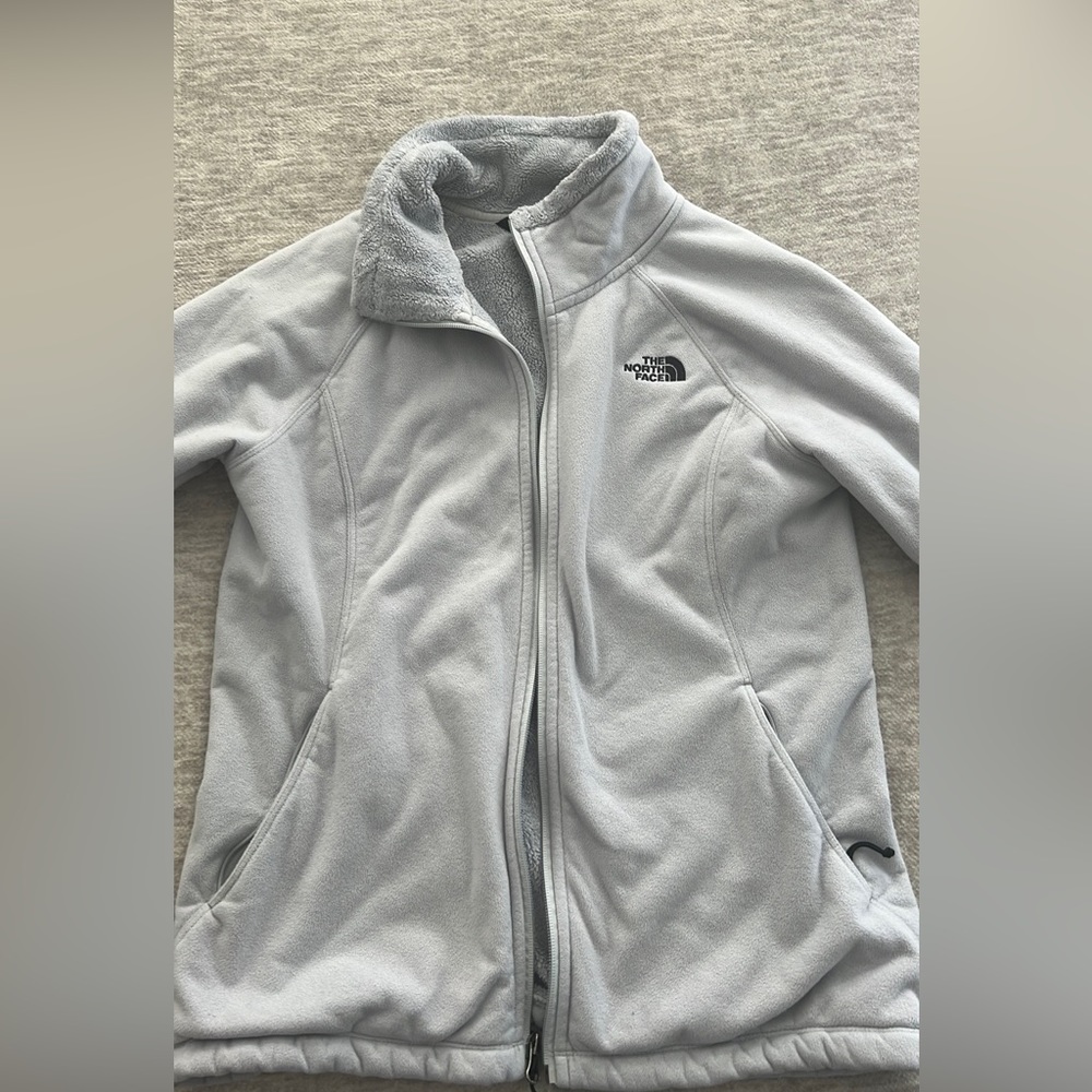 Women’s Gray North Face zip up jacket. Size Medium